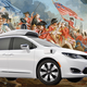 Background: Getty Images. Car: Waymo